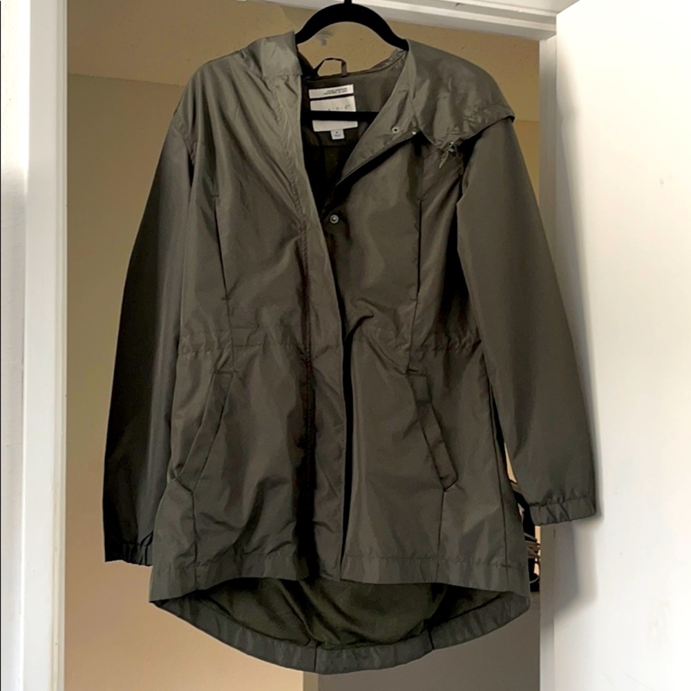 Rain jacket over coat